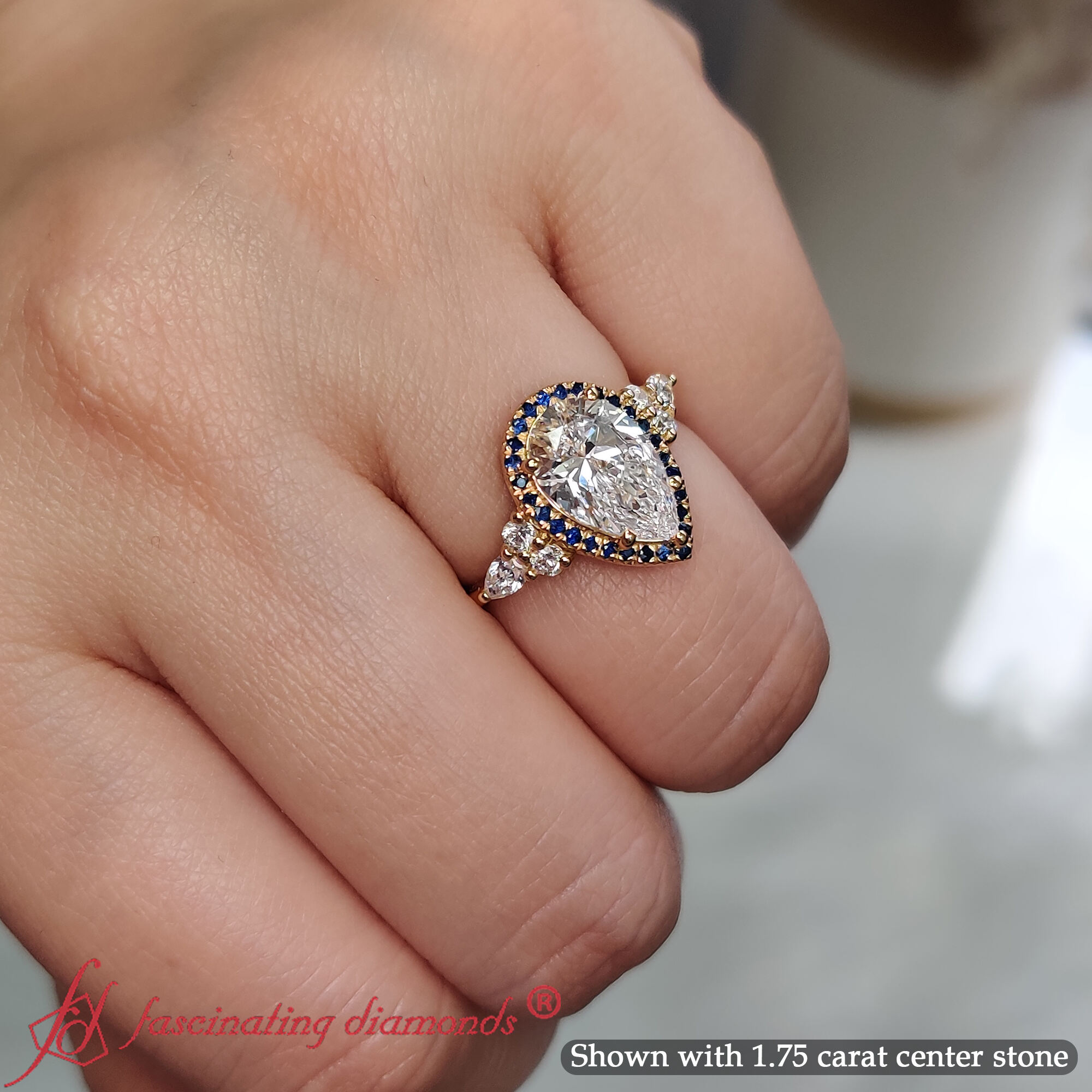 Pear Shaped Halo Cluster Accent Engagement Ring with Blue Sapphire in 18K Yellow Gold