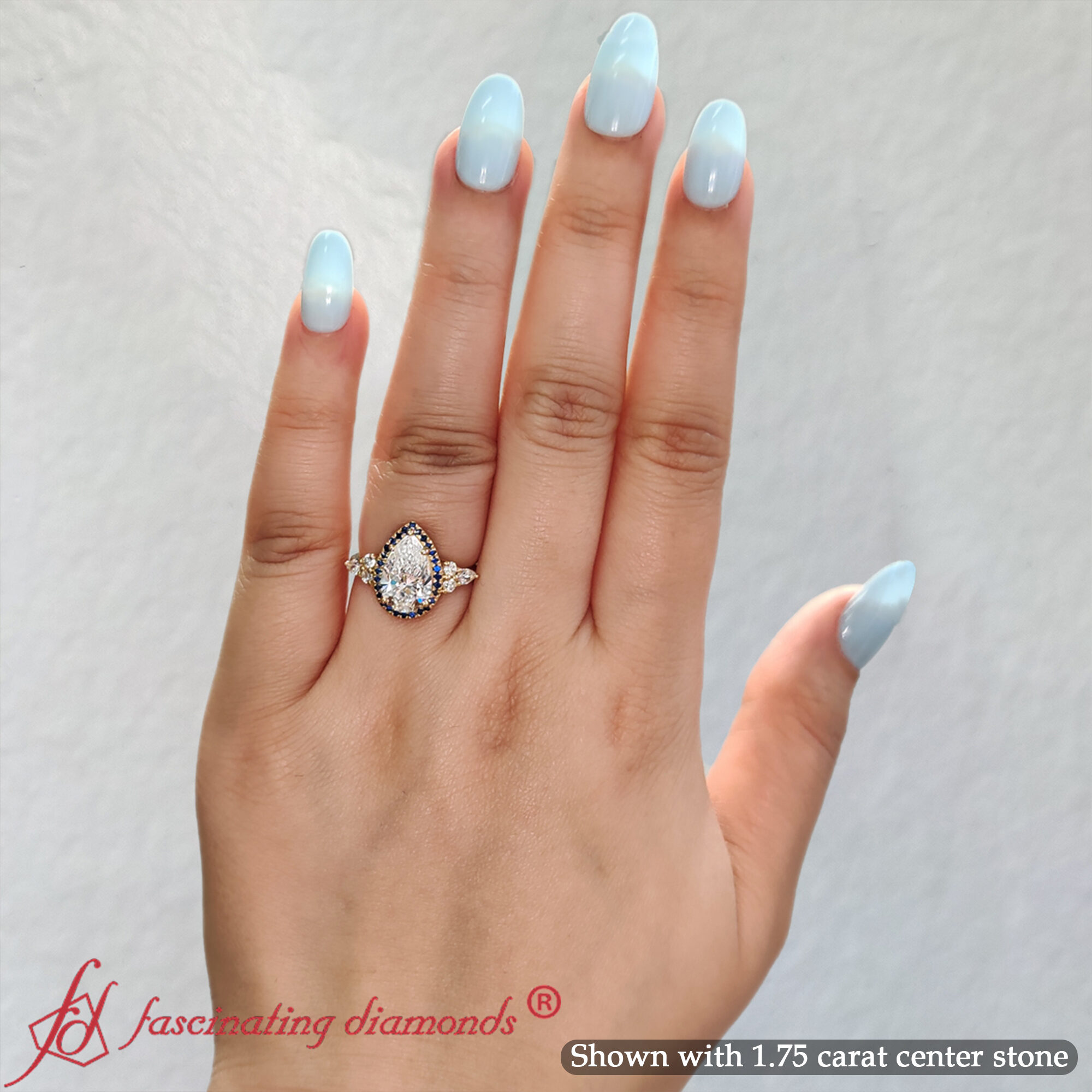 Pear Shaped Halo Cluster Accent Engagement Ring with Blue Sapphire in 18K Yellow Gold