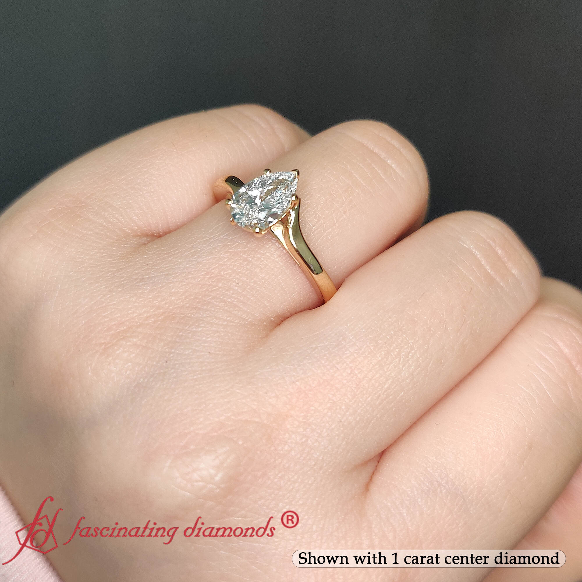 Pear Shaped Twisted Shank Solitaire Engagement Ring with undefined in 14K Yellow Gold