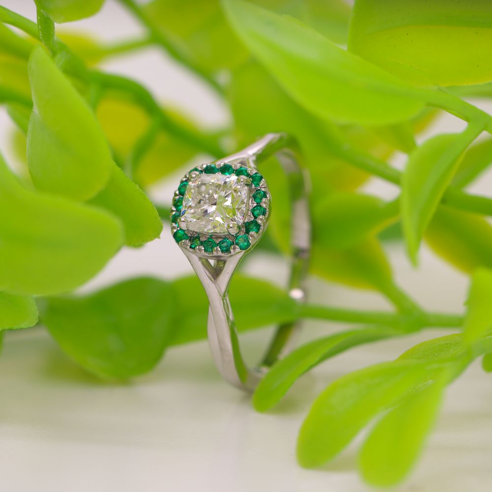 Cushion Cut Twisted Emerald Halo Engagement Ring In Platinum