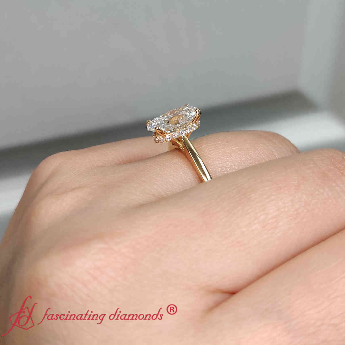 Oval Shaped Secret Halo Engagement Ring with White Diamond in 14K Yellow Gold