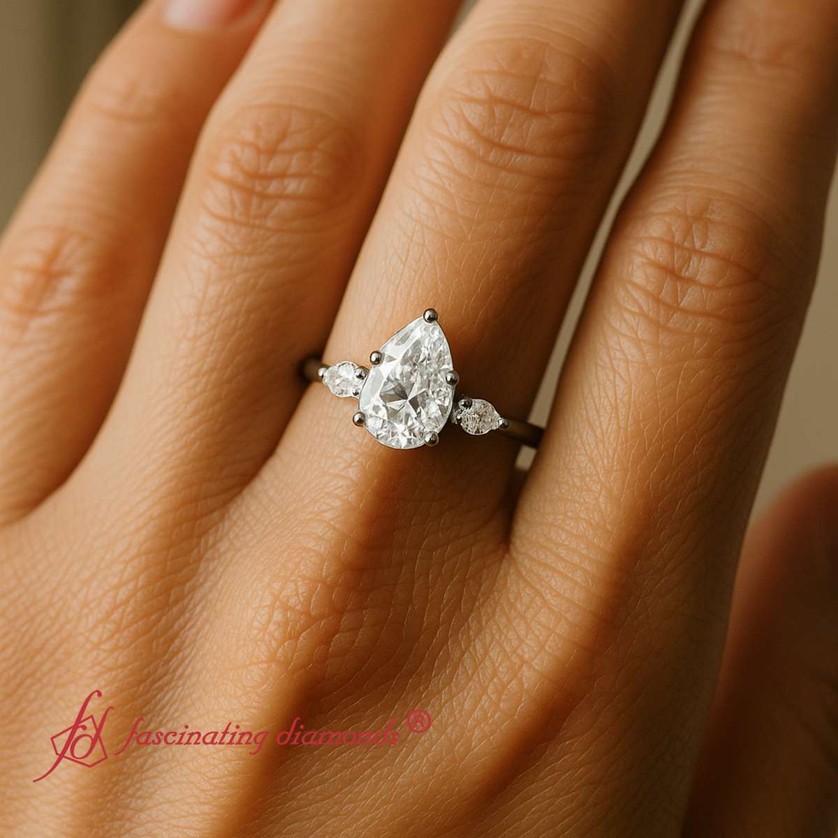 Pear Shaped Tapered 3 Stone Black Gold Ring with White Diamond in 14K Black Gold