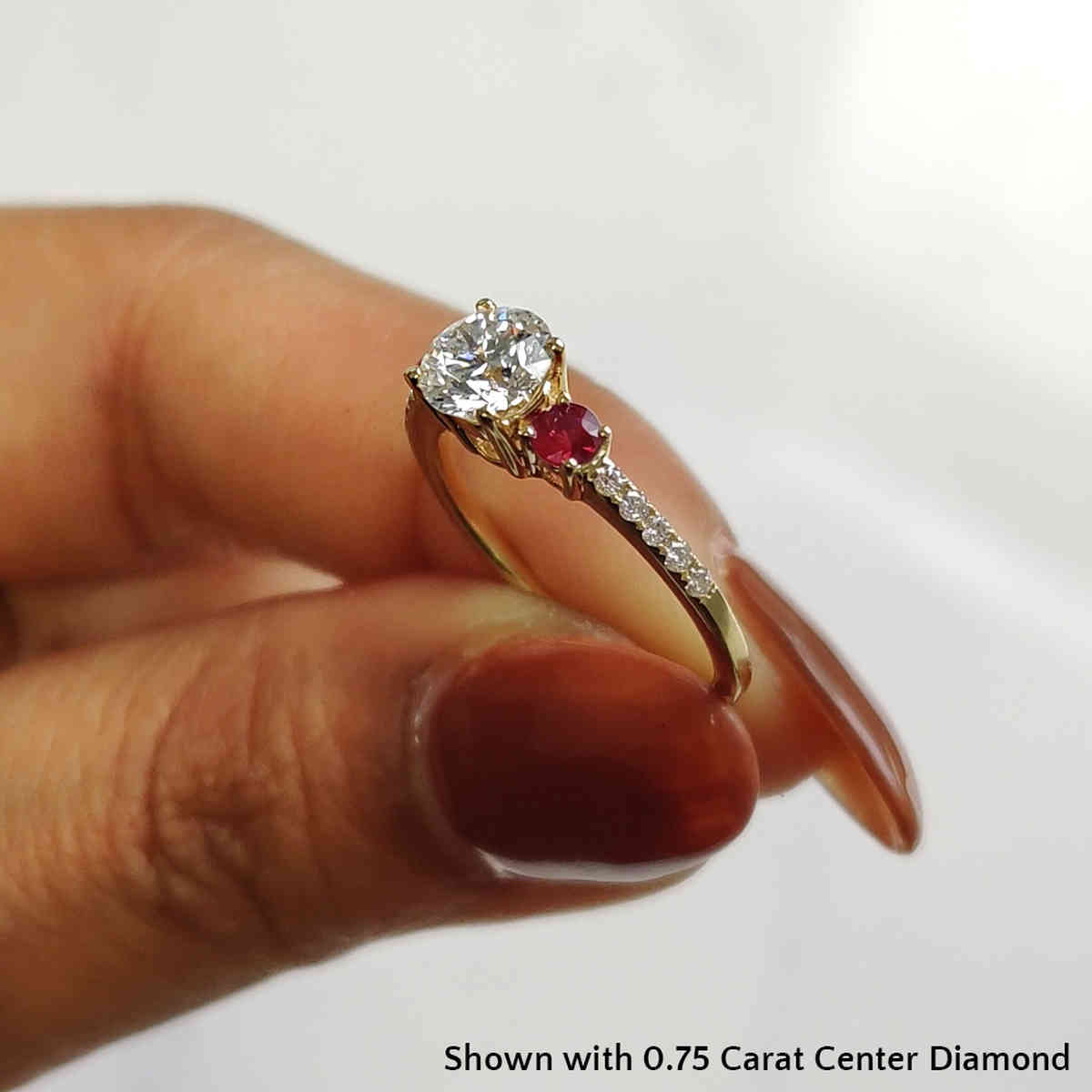 0.75 Carat Round Cut Three Stone Ring with 18K Yellow Gold Red Ruby