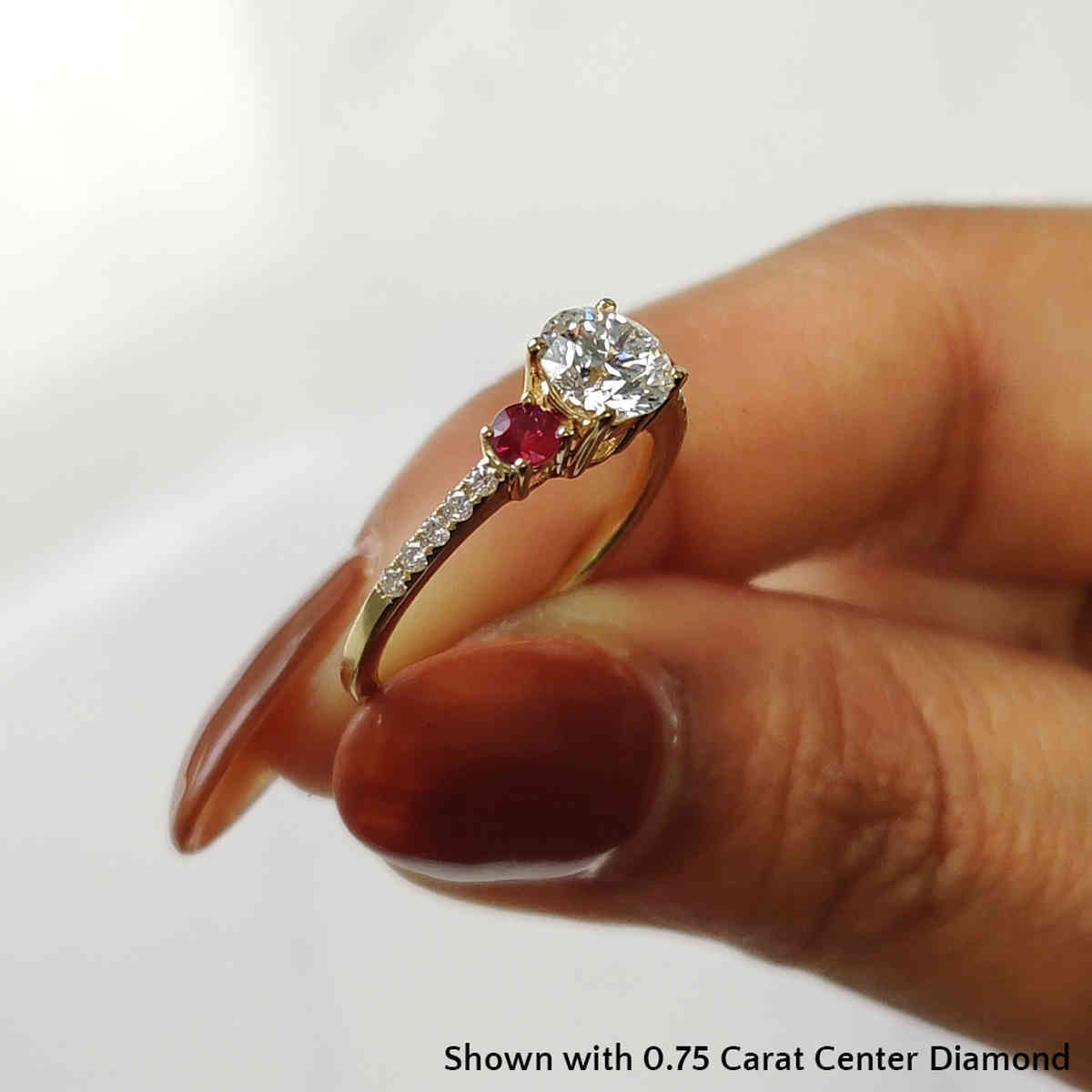 0.75 Carat Round Cut Three Stone Ring with 18K Yellow Gold Red Ruby