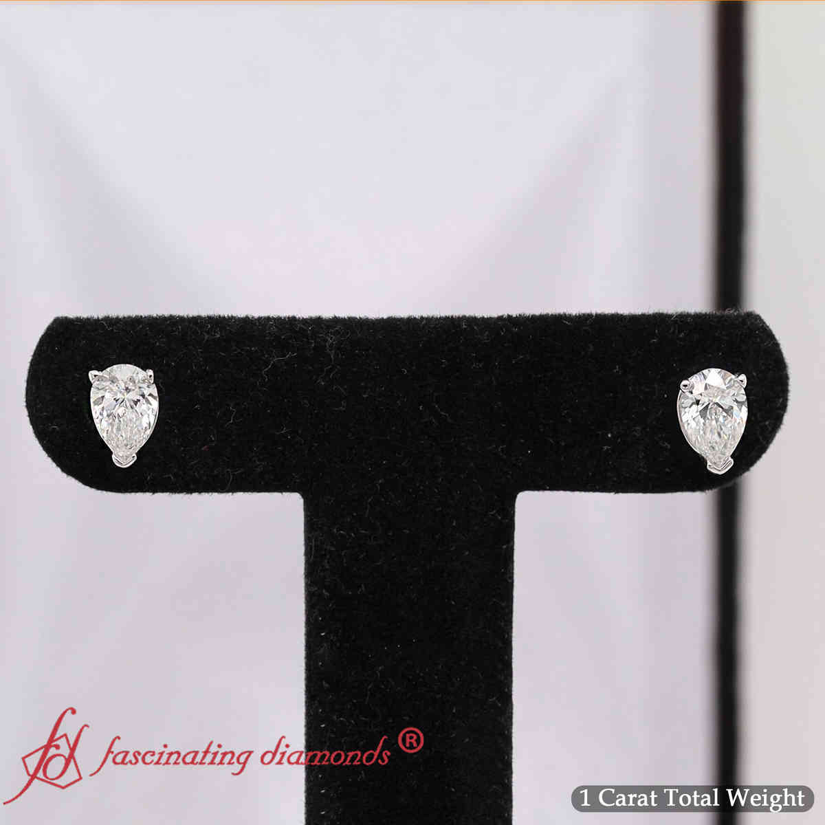 One Carat Diamond Pear Cut 3 Prong Earring with 14K White Gold White Diamond