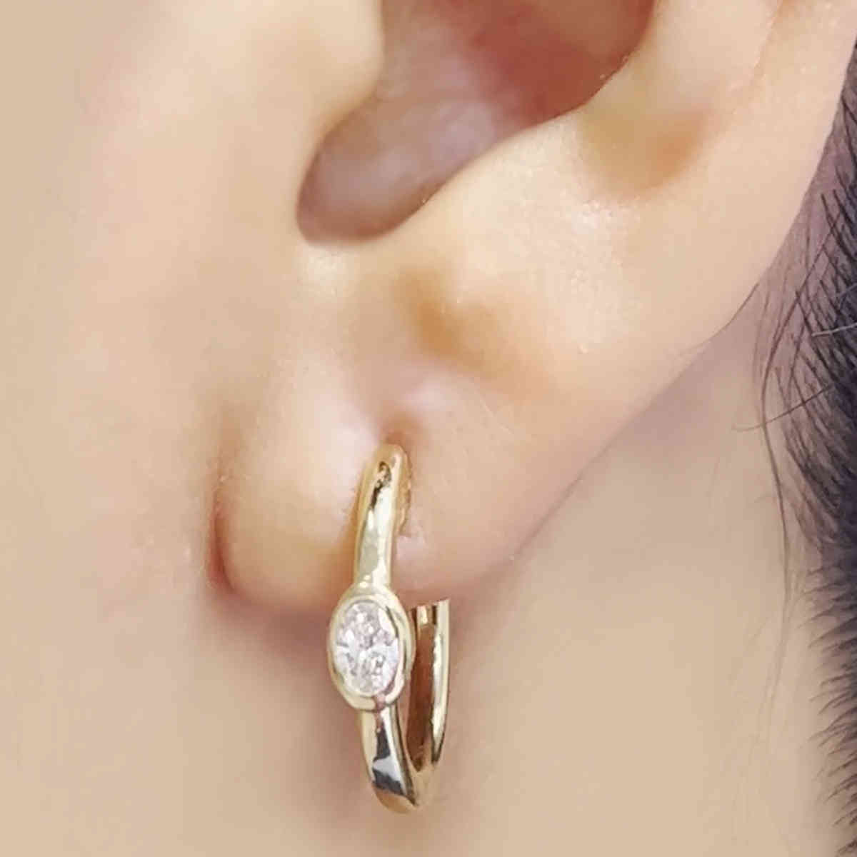 Single Oval Diamond Bezel Huggie Earring with 18K Yellow Gold White Diamond