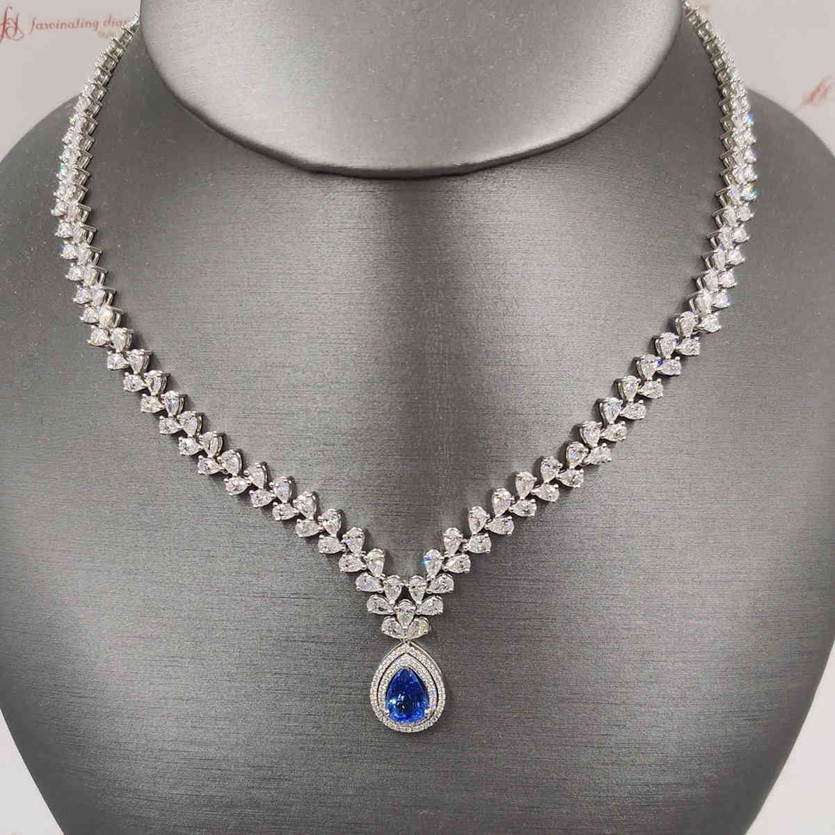 Beautiful Pear Drop Leaf Necklace with 14K White Gold Blue Sapphire
